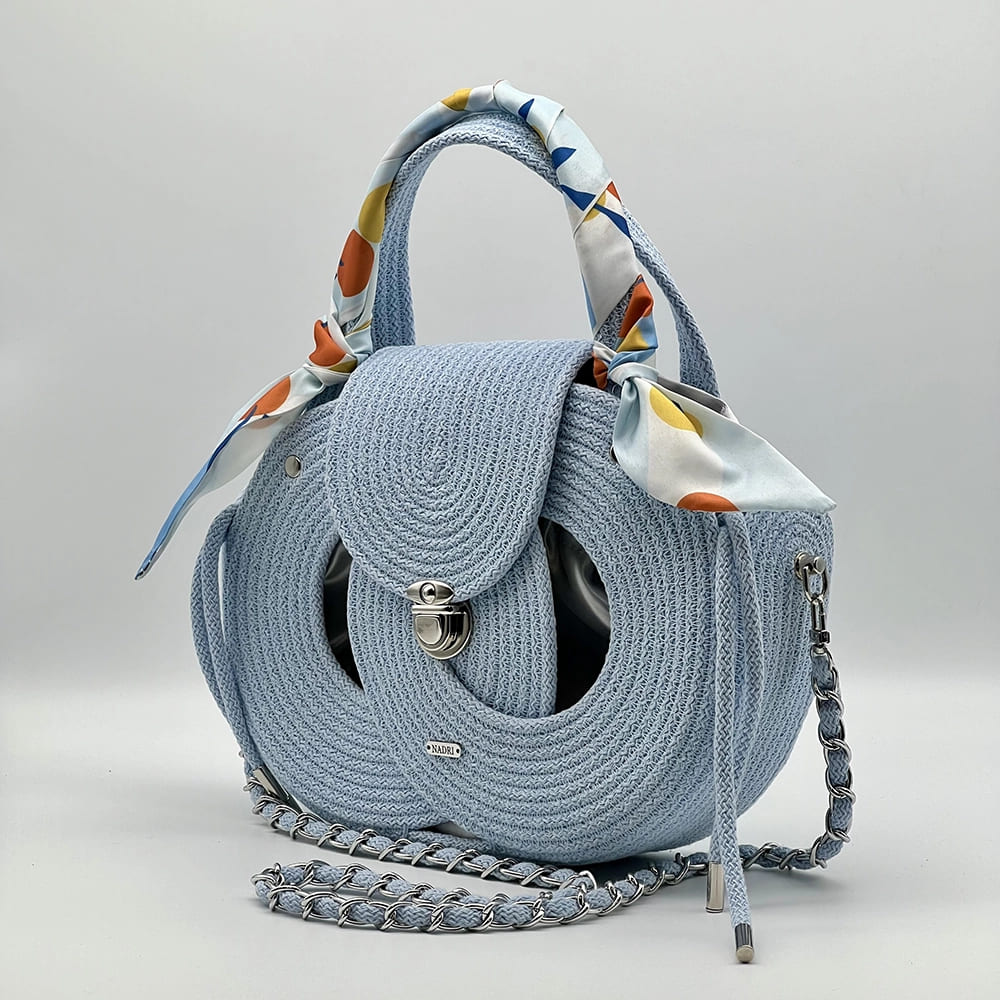 Babakék EVA Infinity limitált designer női táska egymásba fonódó karika mintával a NADRI Bags kollekcióból.