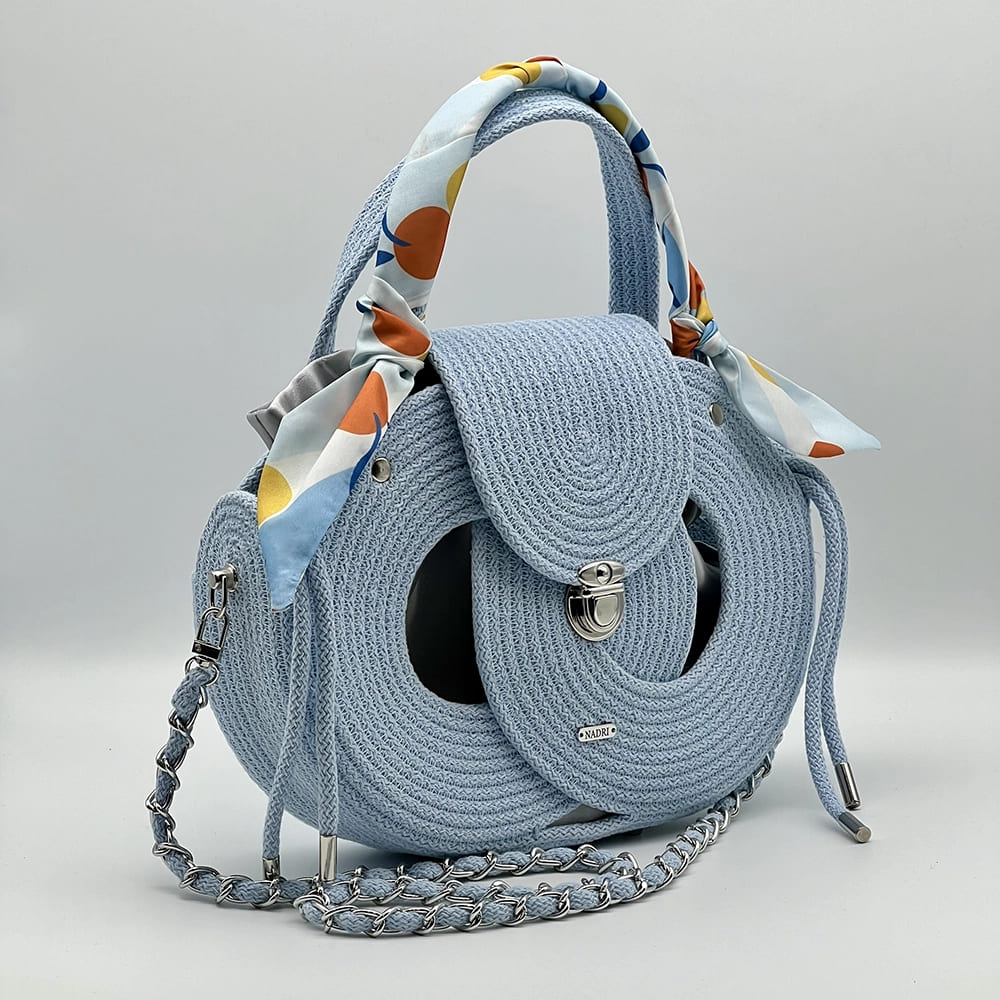 Babakék EVA Infinity limitált designer női táska egymásba fonódó karika mintával a NADRI Bags kollekcióból.