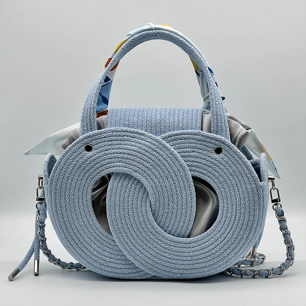Babakék EVA Infinity limitált designer női táska egymásba fonódó karika mintával a NADRI Bags kollekcióból.
