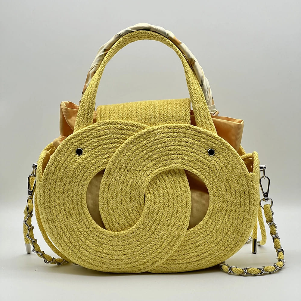 Citromsárga EVA Infinity limitált designer női táska egymásba fonódó karika mintával a NADRI Bags kollekcióból.