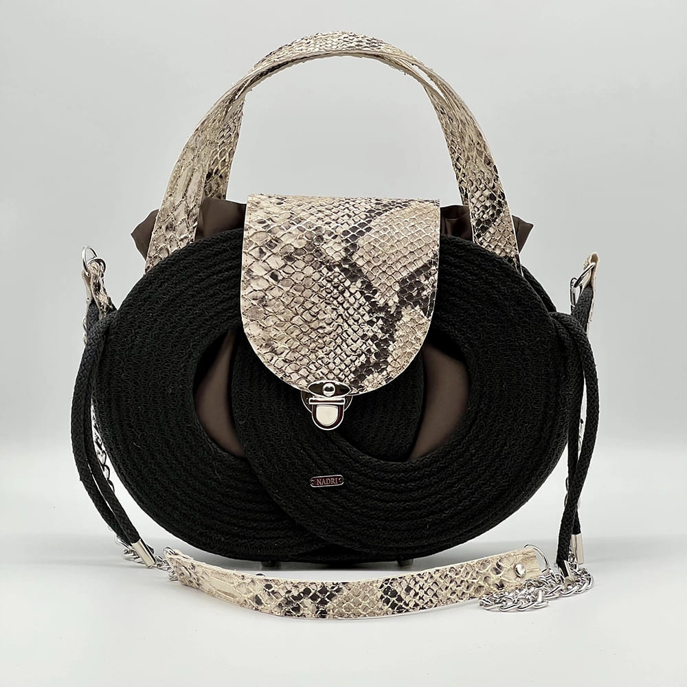 Fekete színű EVA Infinity limitált designer női táska egymásba fonódó karika mintával és valódi bőr kiegészítőkkel a NADRI Bags kollekcióból.