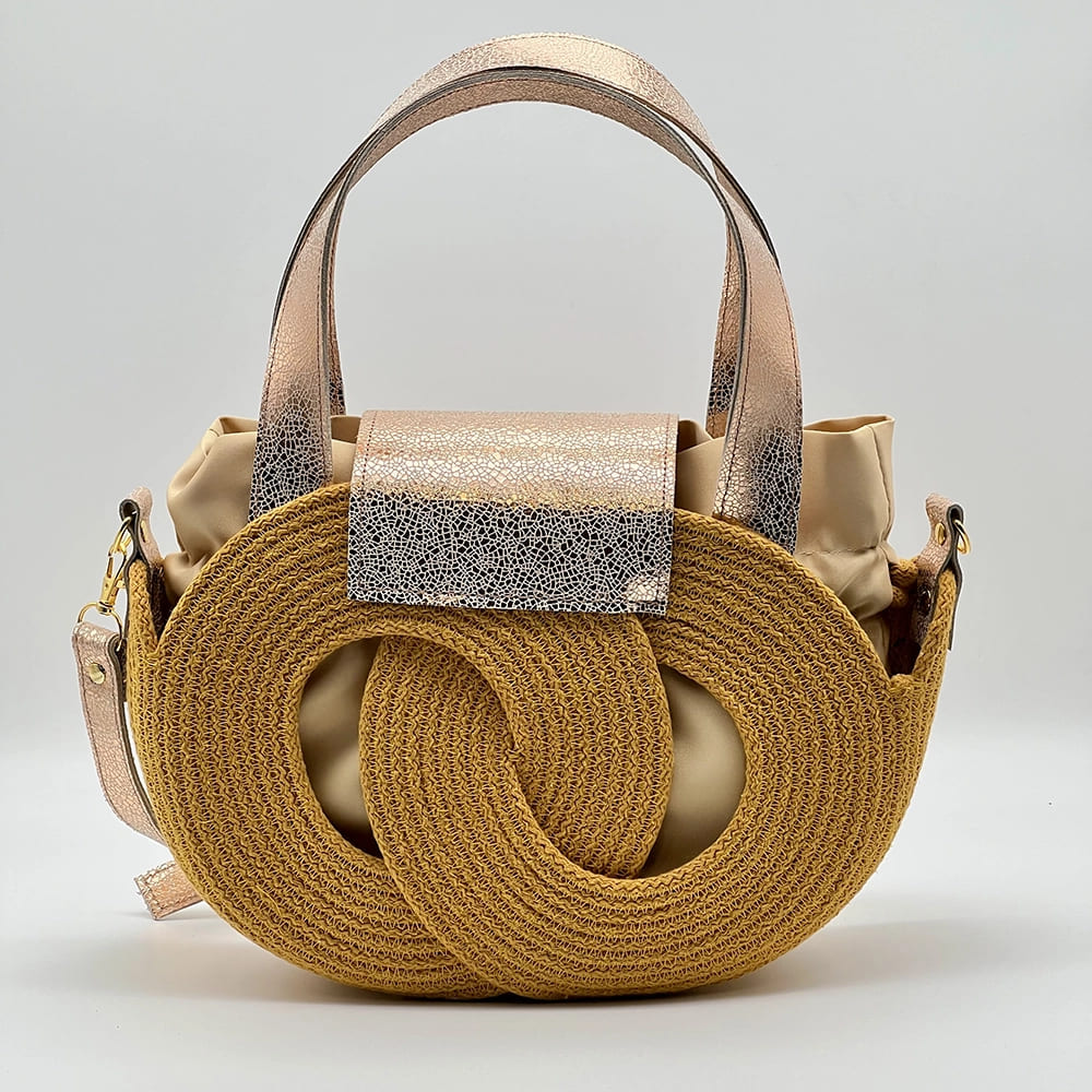 Mustársárga EVA Infinity limitált designer női táska egymásba fonódó karika mintával és valódi bőr kiegészítőkkel a NADRI Bags kollekcióból.