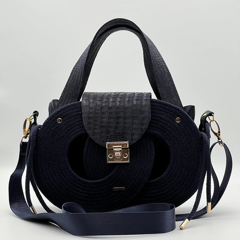 Tengerészkék EVA Infinity limitált designer női táska egymásba fonódó karika mintával és valódi bőr kiegészítőkkel a NADRI Bags kollekcióból.