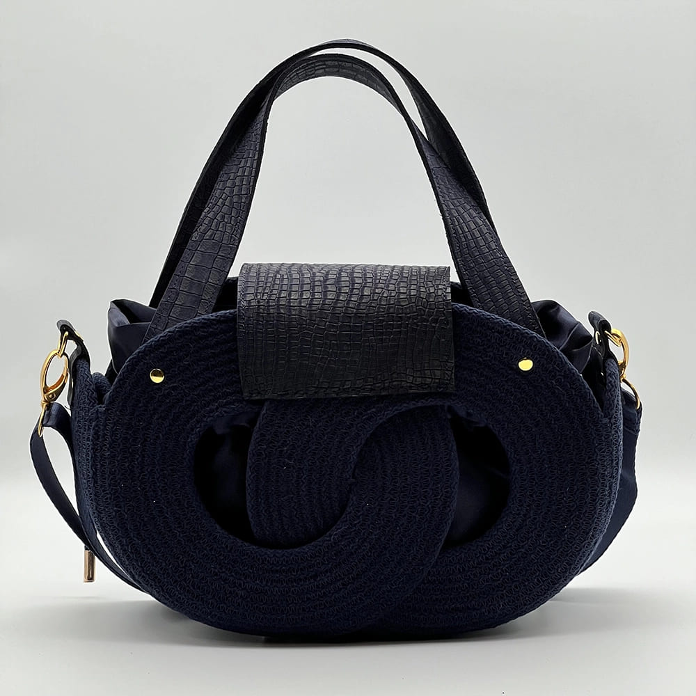 Tengerészkék EVA Infinity limitált designer női táska egymásba fonódó karika mintával és valódi bőr kiegészítőkkel a NADRI Bags kollekcióból.