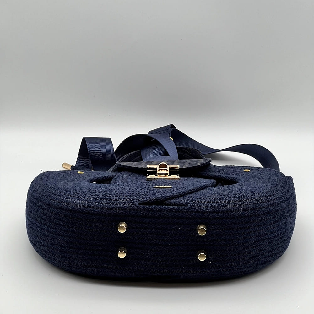 Tengerészkék EVA Infinity limitált designer női táska egymásba fonódó karika mintával és valódi bőr kiegészítőkkel a NADRI Bags kollekcióból.