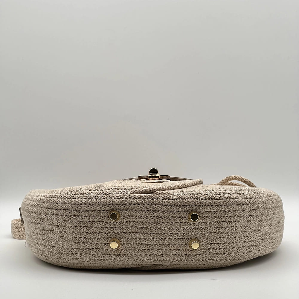 Bézs EVA Infinity limitált designer női táska egymásba fonódó karika mintával és valódi bőr kiegészítőkkel a NADRI Bags kollekcióból.