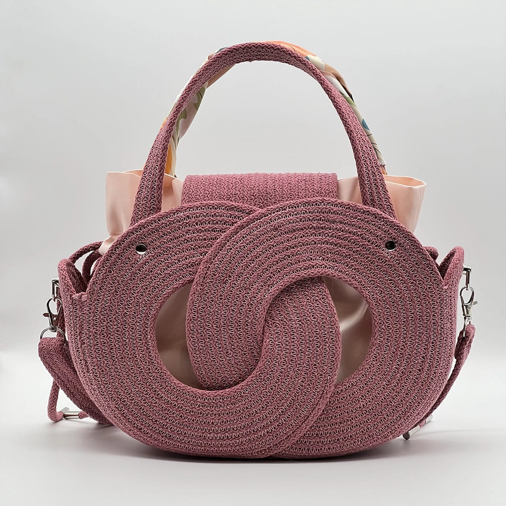 Rózsaszín EVA Infinity limitált designer női táska egymásba fonódó karika mintával a NADRI Bags kollekcióból.