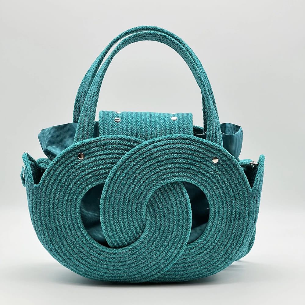 Zöld EVA Infinity limitált designer női táska egymásba fonódó karika mintával a NADRI Bags kollekcióból.