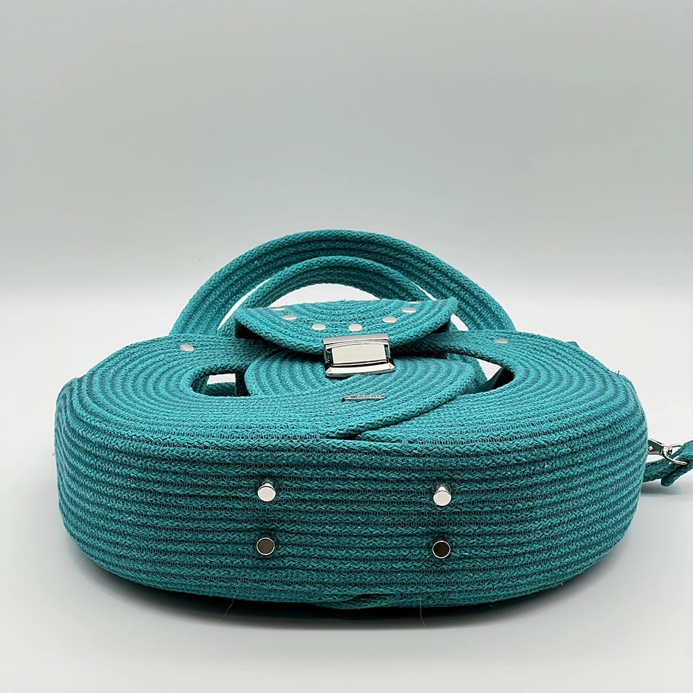 Zöld EVA Infinity limitált designer női táska egymásba fonódó karika mintával a NADRI Bags kollekcióból.