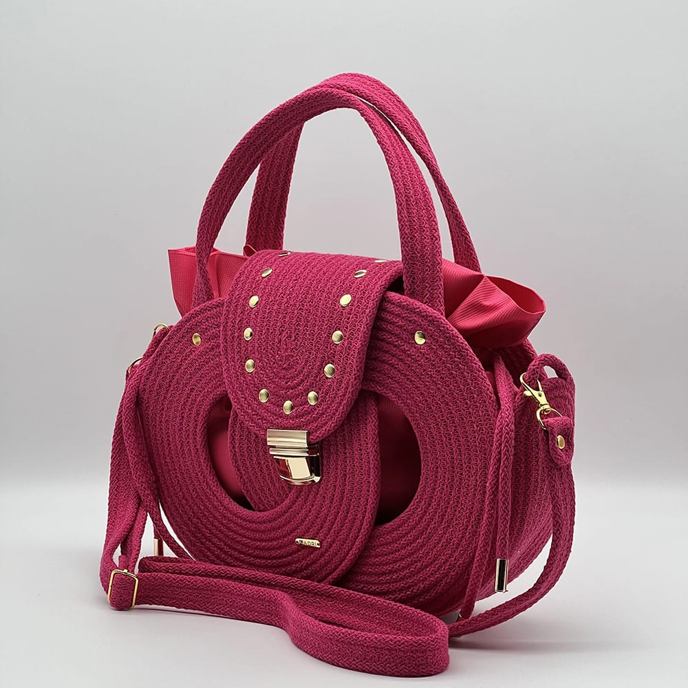 Fukszia pink EVA Infinity limitált designer női táska egymásba fonódó karika mintával a NADRI Bags kollekcióból.