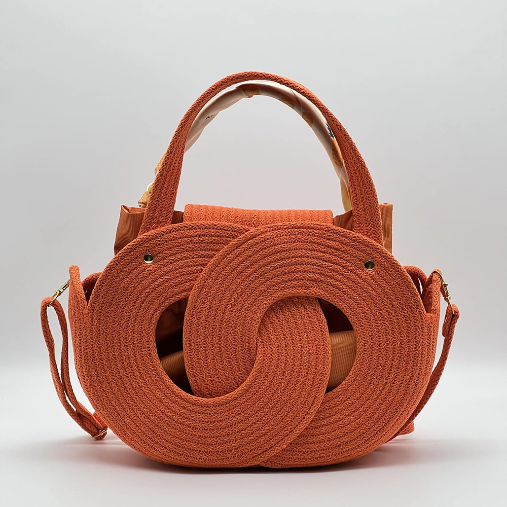 Narancssárga EVA Infinity limitált designer női táska egymásba fonódó karika mintával a NADRI Bags kollekcióból.