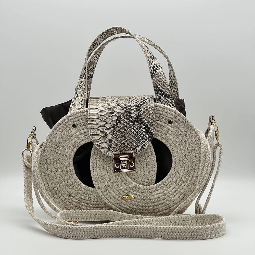 Natúr színű EVA Infinity limitált designer női táska egymásba fonódó karika mintával és valódi bőr kiegészítőkkel a NADRI Bags kollekcióból.