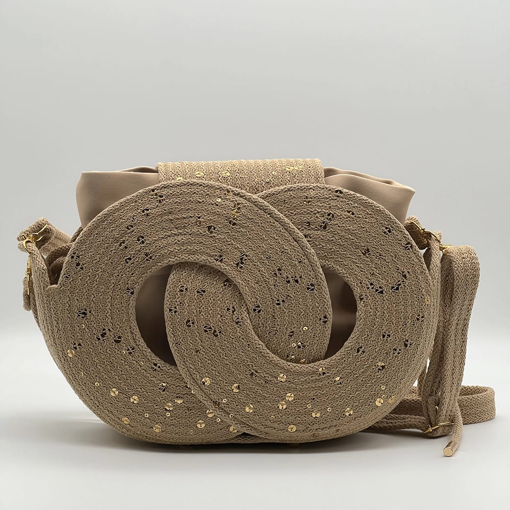 Bézs színű, flitterekkel díszített EVA Infinity limitált designer női táska egymásba fonódó karika mintával a NADRI Bags kollekcióból.